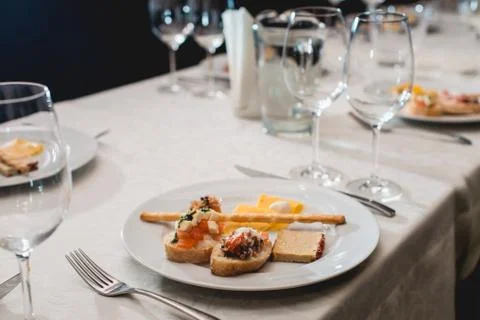 Table served for a wine tasting. Snacks with Pasta, Cheese, Vegetables. Spain Stock Photos