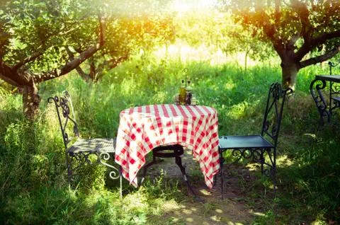 Table is set and waiting for dining in the countryside Stock Photos