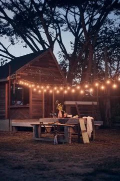 Table is set and waiting for dining in the countryside.. Stock Photos