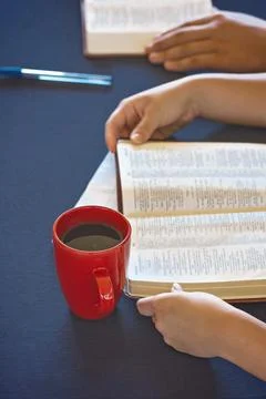 A Table Set for a Bible Study as People Search the Scriptures Stock-Fotos