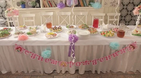 Table is set for birthday party Stock Footage 63783480