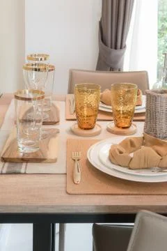 Table set on dining table Stock Photos
