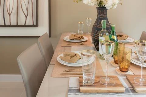 Table set on dining table Stock Photos