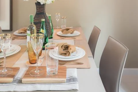 Table set on dining table Stock Photos