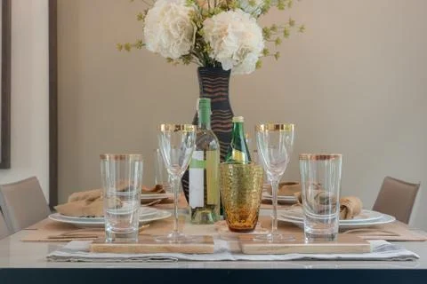 Table set on dining table Stock Photos