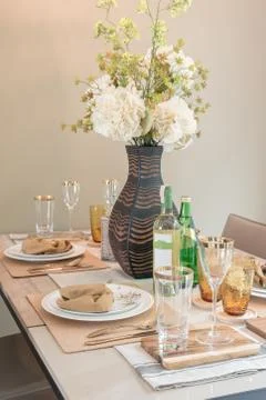 Table set on dining table Stock Photos
