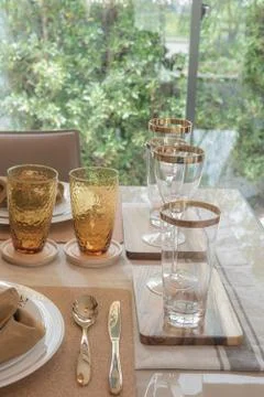 Table set on dining table Stock Photos