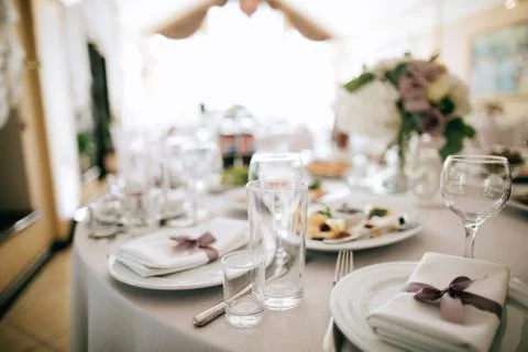 Table set for dinner, catering servise at restaurant Stock Photos