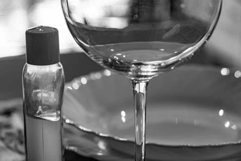 Table set up with dinnerware and silverware, ready for a meal. with disinfectant Stockfoto's