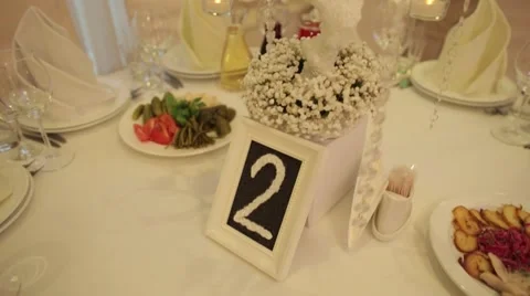 Table set for an event party or wedding reception in winter season Stock Footage 52435280