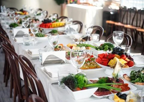 Table set for an event party or wedding reception in a restaurant. Stock Photos