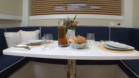 Table set for meal on a boat Stock Footage 32212279