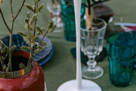 A table set in nature at the dacha in spring for lunch or dinner Stock Photos