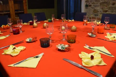 Table set with red tablecloth Stock Photos