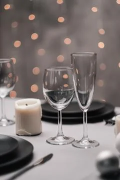 A table set in the restaurant. Serving a table. Grey artistic background. Black Foto stock