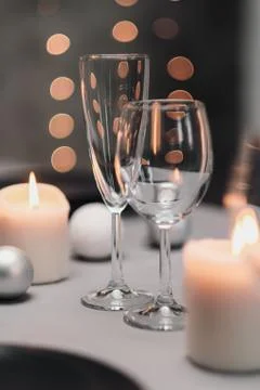 A table set in the restaurant. Serving a table. Grey artistic background. Black Stock Photos