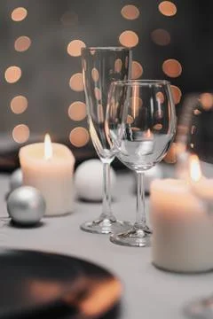 A table set in the restaurant. Serving a table. Grey artistic background. Black Stock Photos