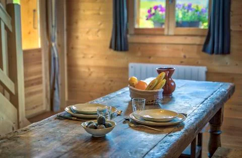 Table set for two people in a mountain chalet, Haute-Savoie, Franc Stock Photos