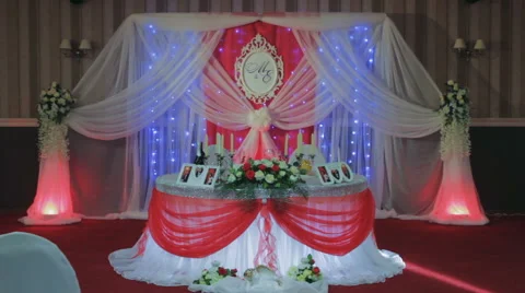 Table Set Wedding Decorated With Flowers and Silk Bow Stock Footage 63208578