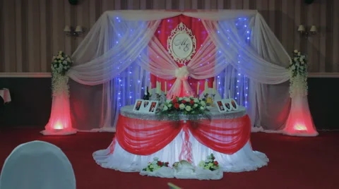Table Set Wedding Decorated With Flowers and Silk Bow Stock Footage 63208587