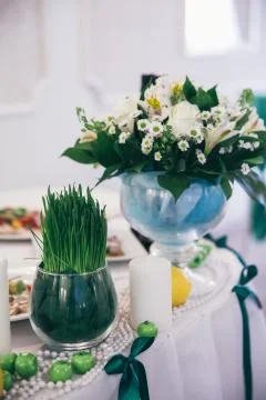 Table set for wedding or another event in green color 写真素材