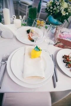 Table set for wedding or another event in green color 写真素材