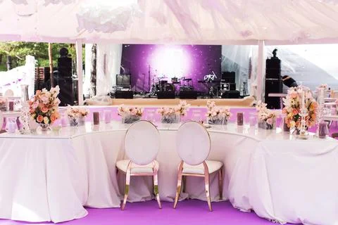 Table set for wedding or another catered event dinner and large white dome Stock Photos