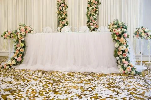 Table set for wedding reception with flowers. 스톡 사진
