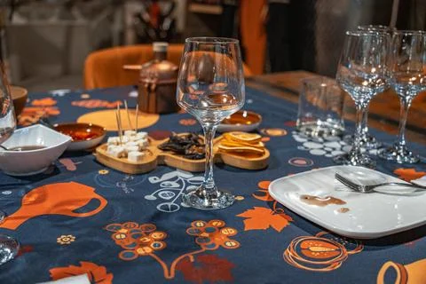 Table set for a wine tasting with dried fruits and cheese Stock Photos