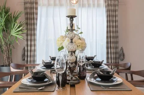 Table set on wooden dinning table Stock Photos