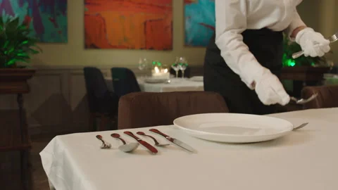 Table-setting and Preparation in a High-end restaurant Stock Footage 283021365
