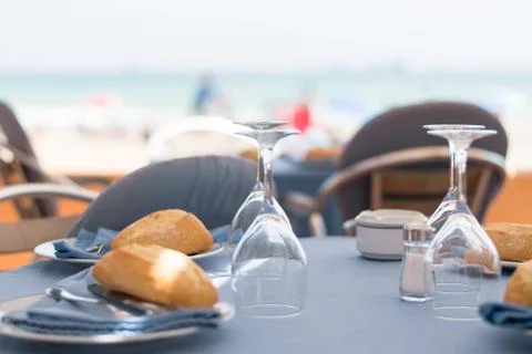 Table setting at beach restaurant. Stock Photos