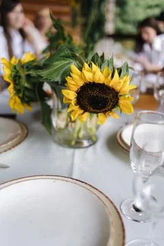 Table setting, beautiful white plates, silver cutlery and crystal glasses Stock Photos