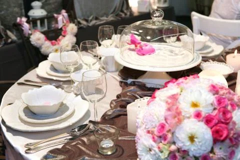 Table setting in beige and brown for elegant dinner Stock Photos