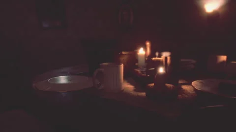 Table setting in candlelight at night Stock Footage 232993739