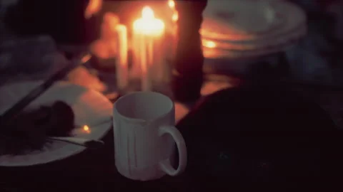 Table setting in candlelight at night Stock Footage 239409860