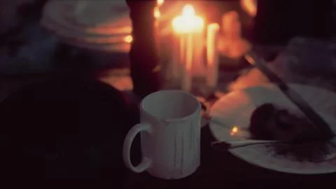 Table setting in candlelight at night Stock Illustration