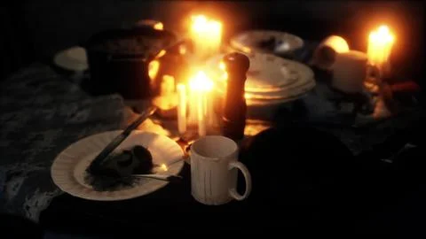Table setting in candlelight at night Illustration