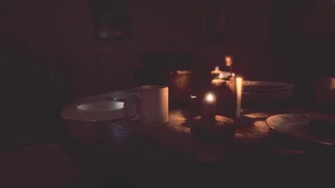Table setting in candlelight at night Stock Illustration