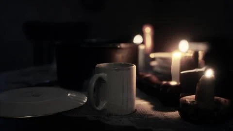 Table setting in candlelight at night Illustration