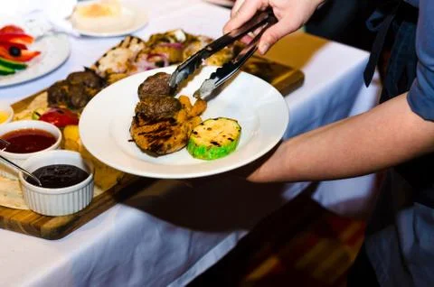 Table setting with cheese and meat dishes Foto stock