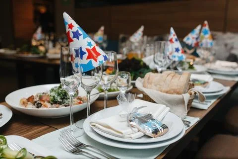 Table setting for children's birthday close-up. Children's party. Stock Photos