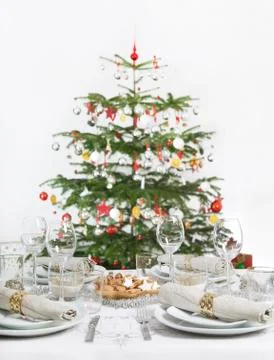 Table setting with christmas tree Stock Photos