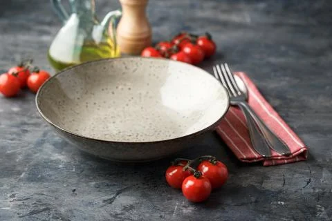 Table Setting With Cutlery, Tomatoes, Cheese and Eggs Stock Photos