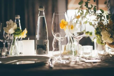 Table setting for dinner or banquet in restaurant on the sunset Foto stock