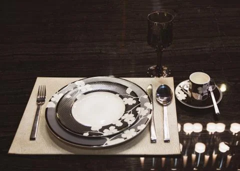 Table setting  Dinner plate in restaurant Stock Photos