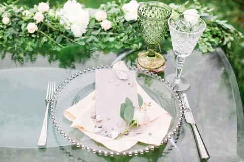 Table setting with dishes and floristic 写真素材