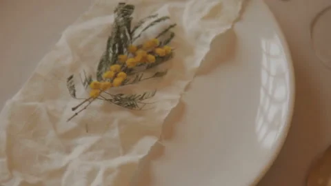 Table setting with dried flowers, beige tones and golden cutlery Stock Footage 168331251
