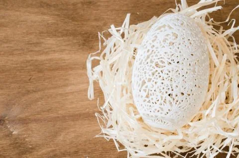 Table Setting for Easter Celebration. Carved Egg. Stock Photos