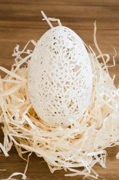 Table Setting for Easter Celebration. Carved Egg. Stock Photos